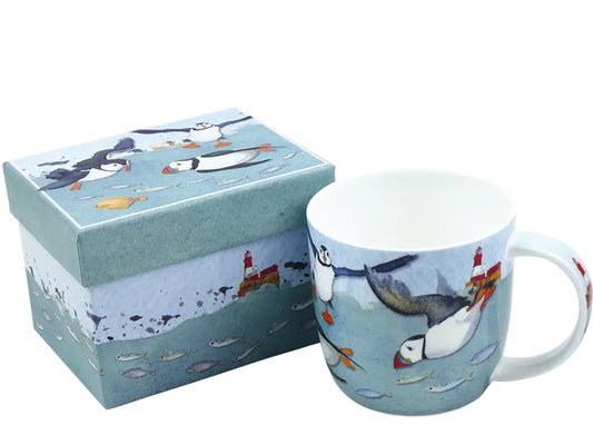 Crafted by Emma for her Puffins Collection, these Fine Bone China mugs are elegantly showcased in a striking gift box, rendering them an impeccable gift for a cherished individual. Dishwasher & Microwave Safe Capacity of 350ml Height 8.5 cm Diameter 9 cm