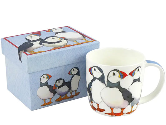 Conceived by Emma Ball, this Fine Bone China mug featuring Puffins is elegantly showcased in a captivating gift box, making it the ideal gift for a special someone. Dishwasher & Microwave Safe Capacity of 350ml Height 8.5 cm Diameter 9 cm