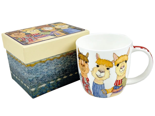 A white ceramic mug with a colorful illustration of three alpaca-like animals, shown next to its matching illustrated gift box on a plain white background.