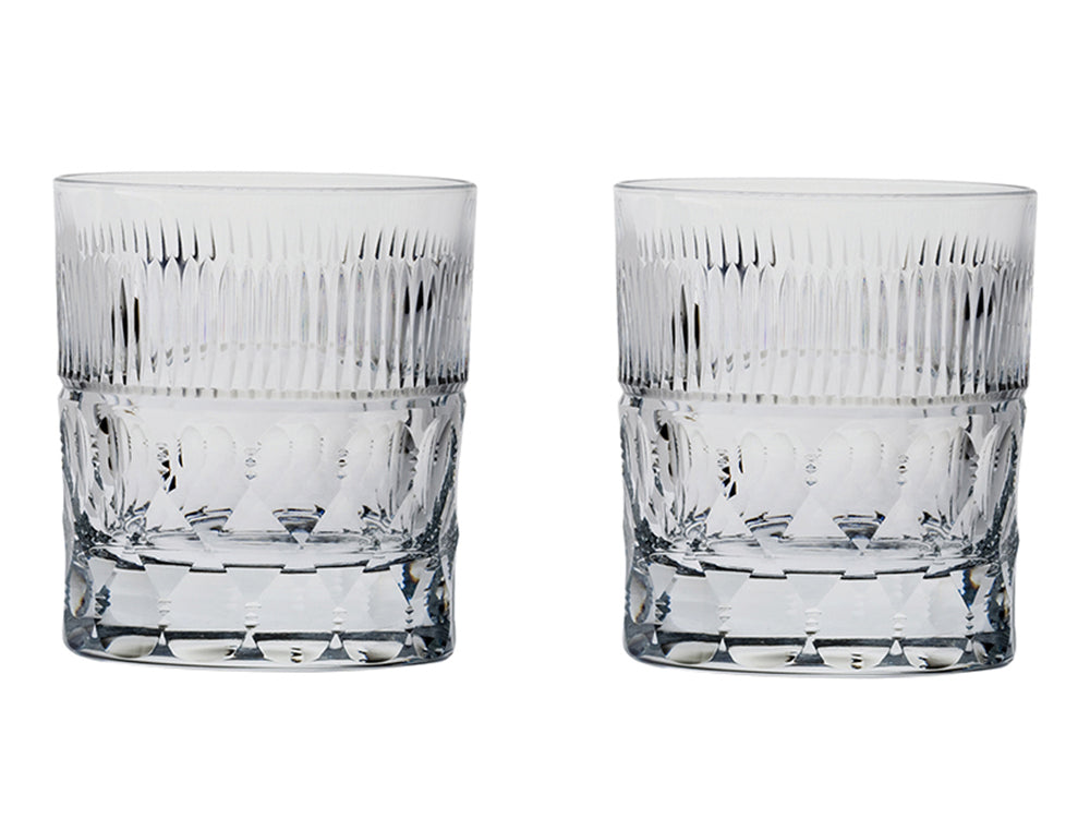 A pair of delicately cut crystal tumblers