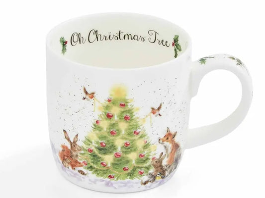 Christmas-themed mug with a tree and animals on a white background