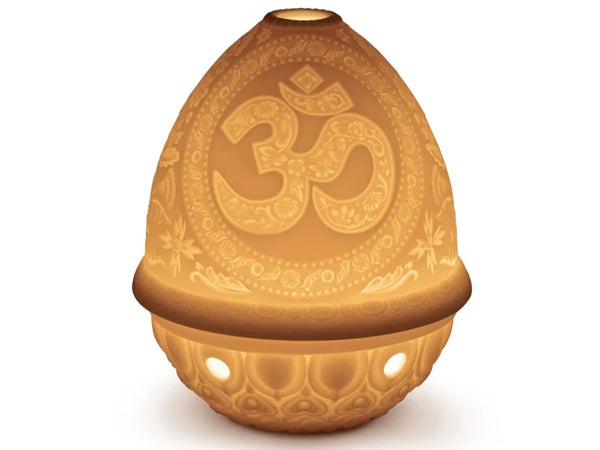 This amazing porcelain Lithophane Votive Light - OM is delicately engraved which is finely depicted when lit. This piece is just one of the beautiful lithophanes we offer in our lithophane collection.