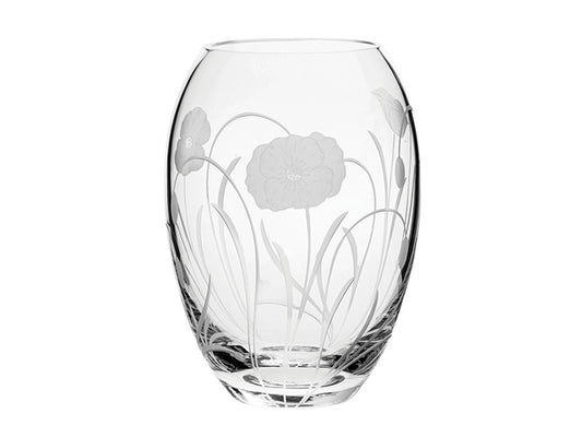 A small barrel shaped crystal vase with a poppy pattern engraved into the outside