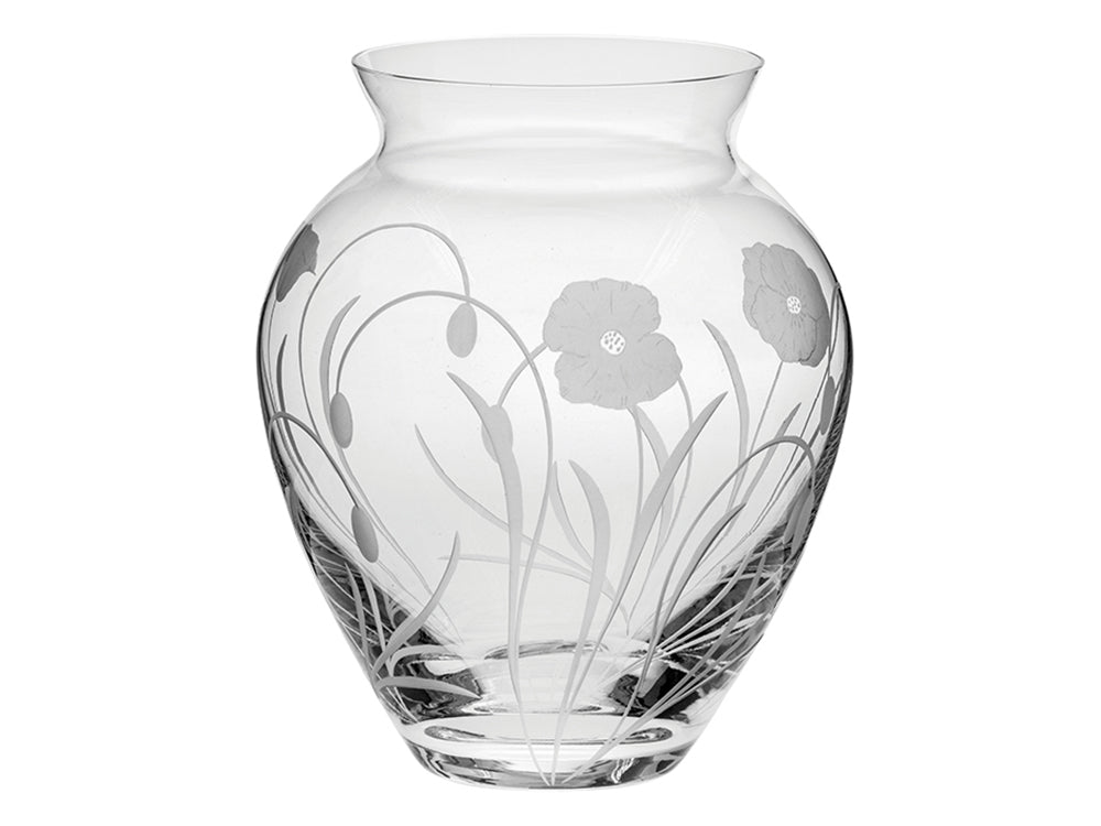A large crystal posy vase with a poppy design cut into the outside