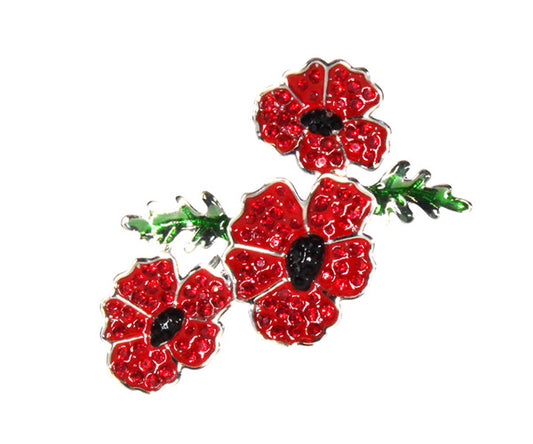 This delicate triple poppy brooch is embellished with red & black enamels & crystals,