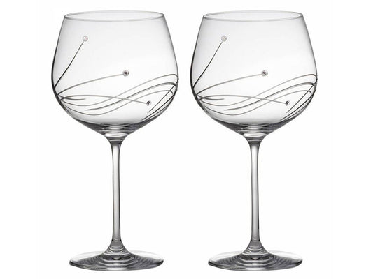 Royal Scot Diamante Gin Copa Glasses Pair are crafted of a hand-cut crystal in Britain and both engraved with an elegant triple-swirled pattern that sweeps around the main body of the glasses, each tipped with a Swarovski crystal.