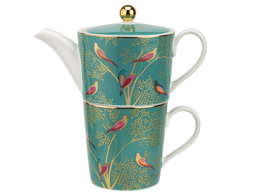A stacking mug and teapot set in a vibrant green design, featuring gold foliage and brightly coloured birds.