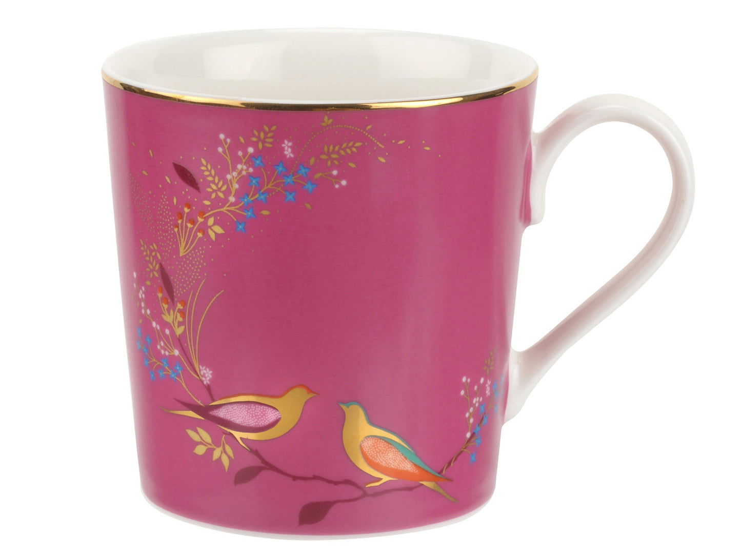 A mug with a pink background, featuring gold embellishments, two birds and abstract foliage
