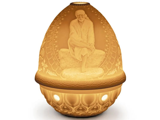 This stunning new edition to the Lladro Lithophane Collection features Sai Baba, an Indian Spiritual Leader famed for his teachings of the moral code of love, forgiveness, helping others, charity, contentment and inner peace.