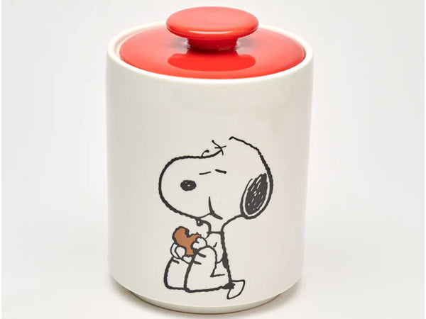Shop the Snoopy cookie jar with red lid—cute ceramic kitchen storage for cookies, biscuits and sweets. Perfect Peanuts gift and countertop décor.