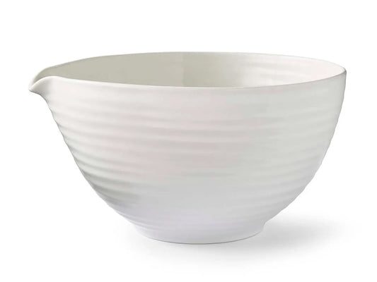 White porcelain Sophie Conran medium mixing bowl with signature ripple texture and pouring spout.