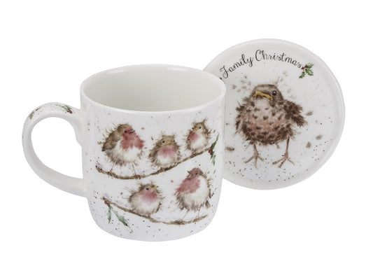 A white mug and coaster with various bird designs on them