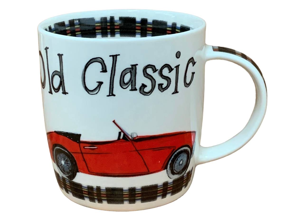 A white ceramic coffee mug featuring a red convertible car illustration and the text 'Old Classic' in black script, with a black and orange striped pattern on the handle and rim.