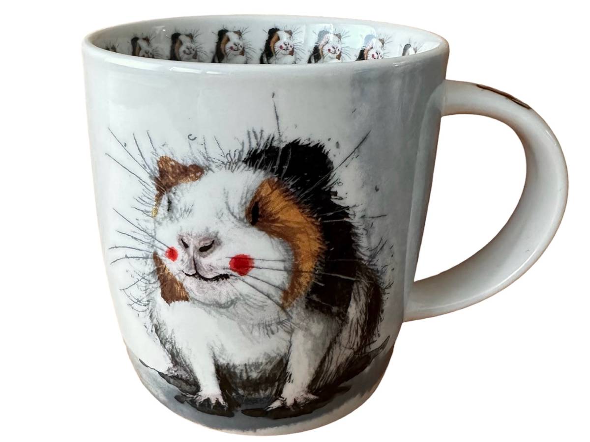 A white ceramic mug featuring a detailed illustration of a guinea pig on the front, with a repeating pattern of the same guinea pig design around the inner rim.
