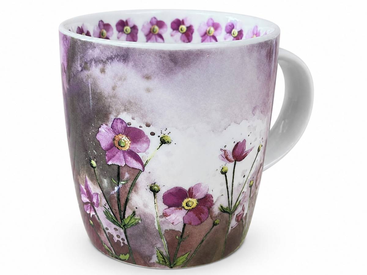 A white ceramic mug decorated with a watercolor-style floral design featuring purple flowers and green stems against a soft gray and purple background, with a matching row of small purple flowers around the inner rim.