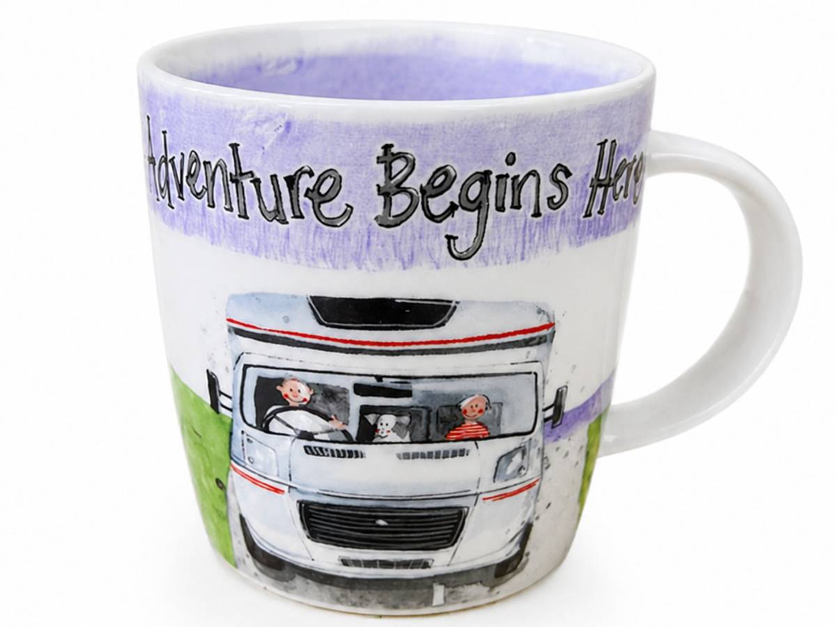 A white ceramic mug featuring a hand-painted illustration of a motorhome with people and a dog inside, under a purple watercolor-textured band with the text 'Adventure Begins Here'.