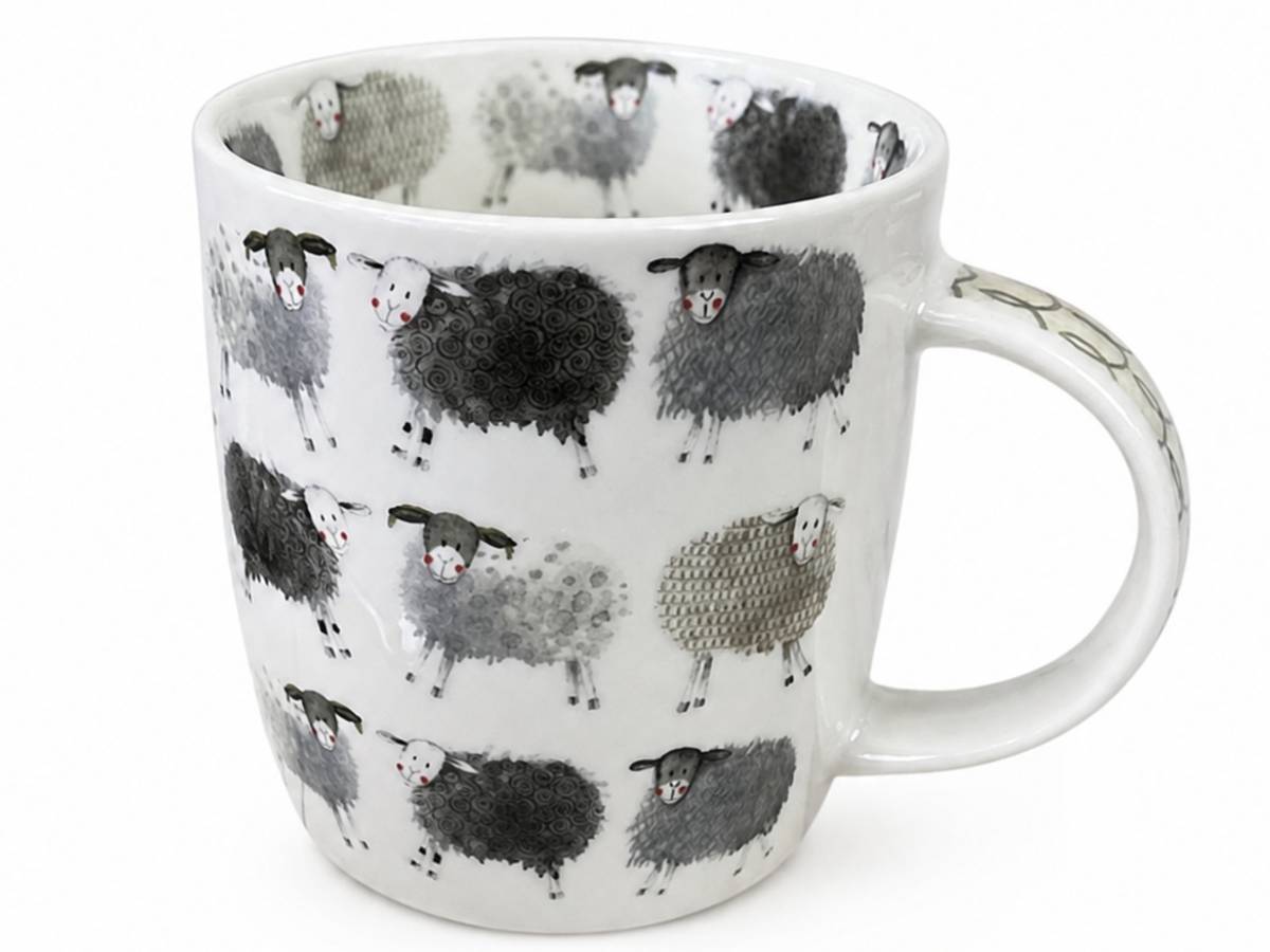 A white ceramic mug decorated with a repeating pattern of black, gray, and white sheep, shown against a plain white background.