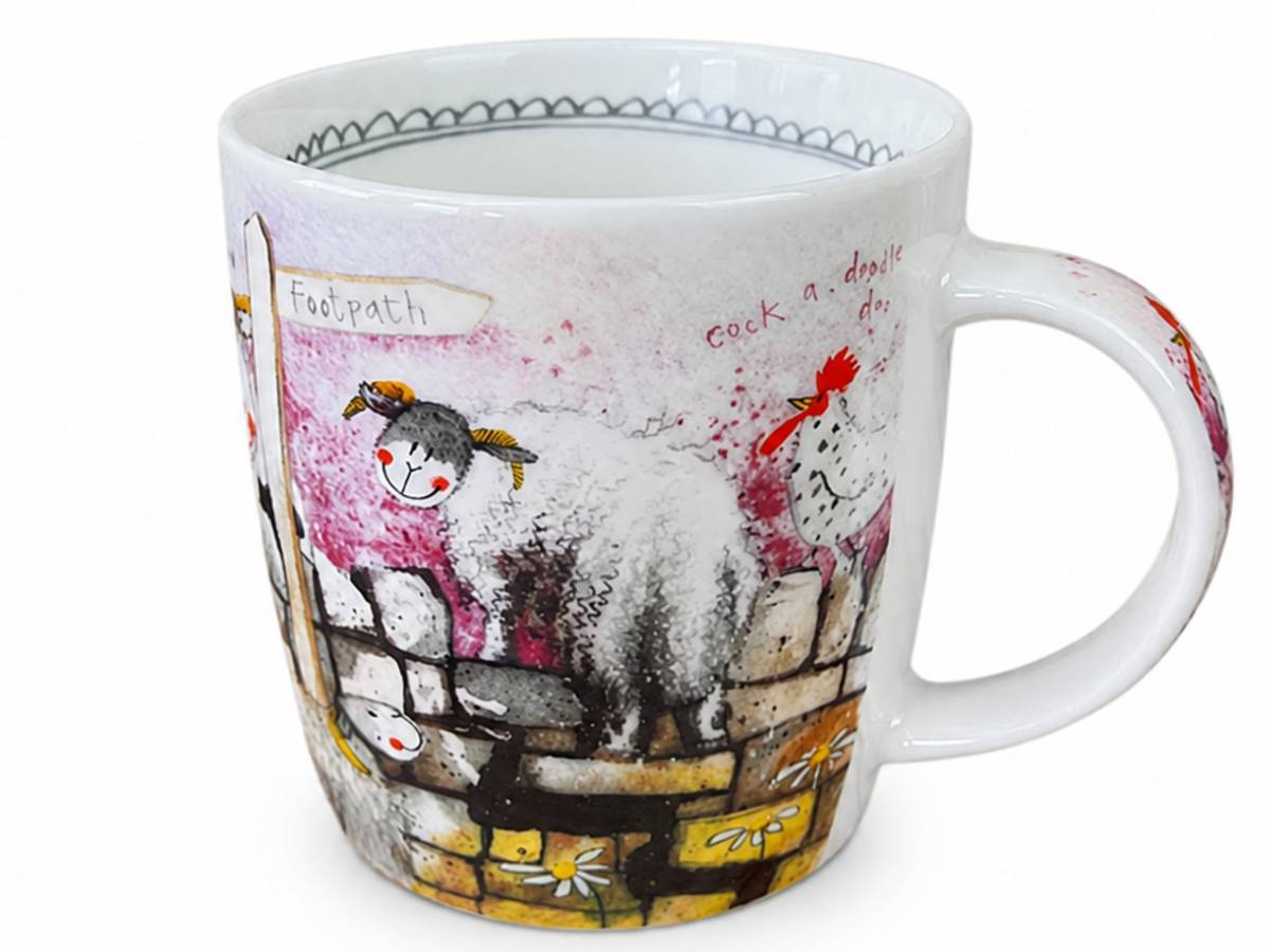 A white ceramic mug featuring a whimsical, hand-painted style illustration of a sheep on a wall with the words 'Footpath' and 'cock a double dot'.