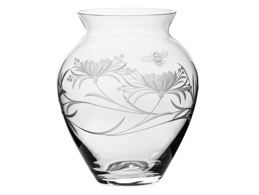 This Royal Scot Crystal Bee & Honeysuckle Large Posy Vase has been hand-cut in Britain with a frosted honeysuckle and bumblebee design all around its exterior. Wide-bodied and tapering inwards at its neck, this vase would be ideal for the display of longer-stemmed flowers.