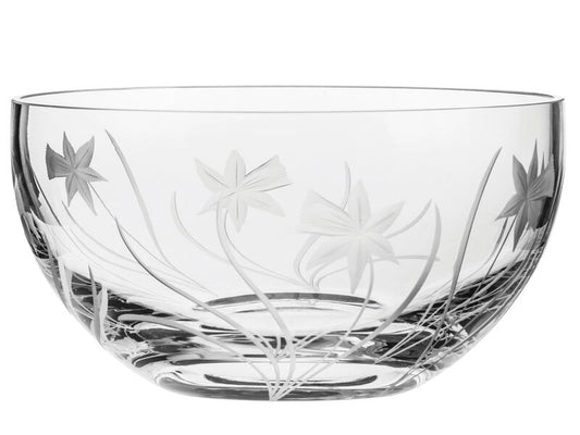 A beautiful crystal bowl with daffodils cut into the sides, giving a delicate frosted flower effect