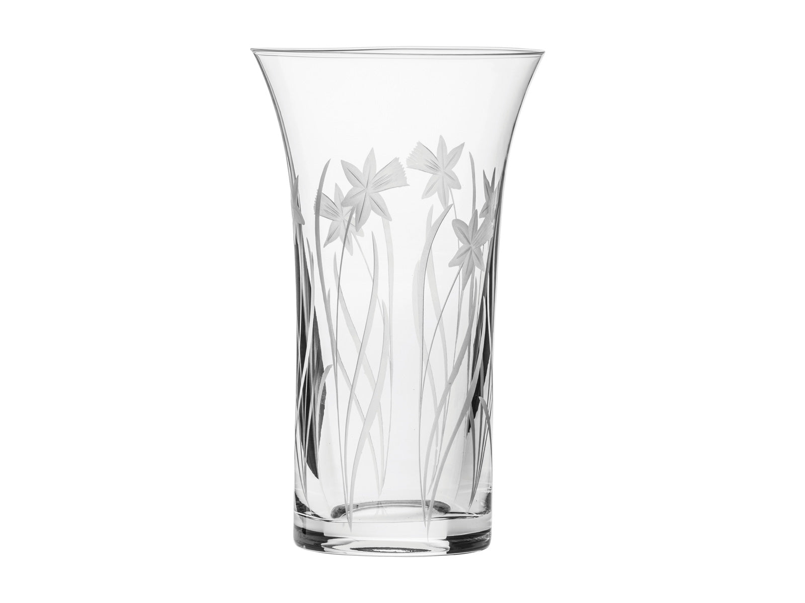 A crystal vase that flares out gently at the top, featuring a hand-cut daffodil motif across the sides