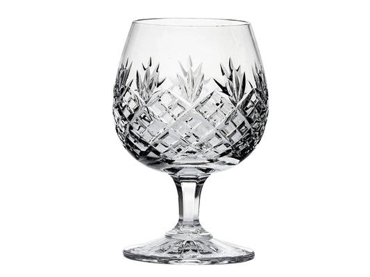 A hand-cut crystal brandy glass with diamonds and triple flicks in the design