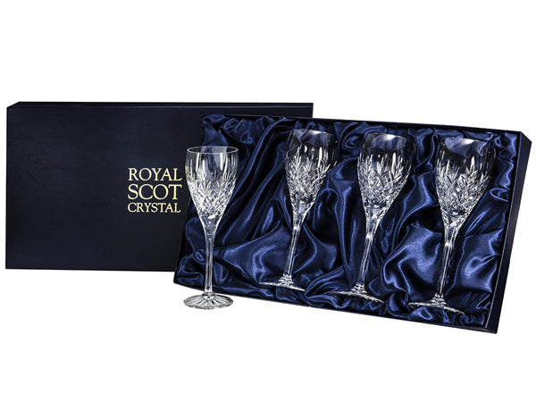 Set of four large Royal Scot Crystal Edinburgh wine glasses with rounded bowls and an intricate diamond-shaped cut around the base of the bowl, with flicks going up the body of the glass.