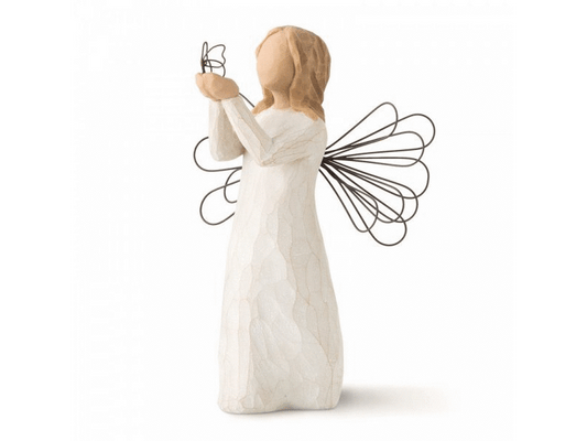 A cast stone figurine featuring a faceless, feminine angel. She wears a crackled white dress with outstretched arms, holding a wire butterfly in her open palms. Her dress is adorned with wire wings in a sparkler art style that protrudes from the back. The angel has medium-length, brunette hair.