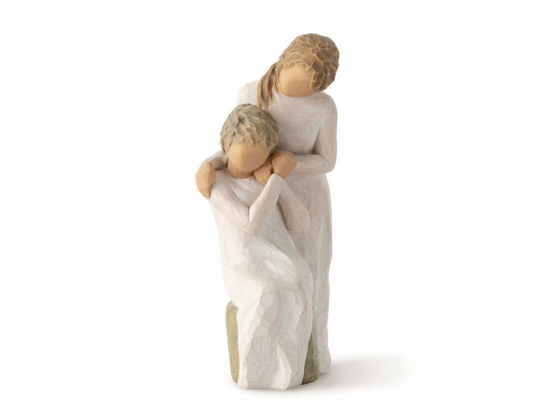 A beautiful Willow Tree figurine titled ‘Loving My Mother’ depicts an older daughter standing over her shoulder of her elder mother, holding one another in a warm embrace. Both mother and daughter have smooth featureless faces, to allow for your own familial interpretations. Featuring a natural palette of soft colours, this piece remains elegant and timeless.
