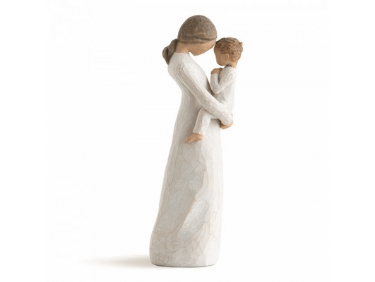 A Willow Tree cast stone figurine of mother holding a child to her front, whilst their foreheads gently touch. Both mother and child have featureless faces to allow for your own interpretation. This figurine is painted in earthy, soft tones of cream, grey, beige and brown.