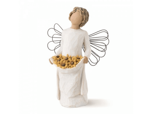A beautiful willow figurine of a faceless, feminine angel, with short curly hair, kept close to her head. Her wire wings sit on her back, attached to a flowing white gown, where she holds yellow flowers in the folds of the dress, like a pouch.