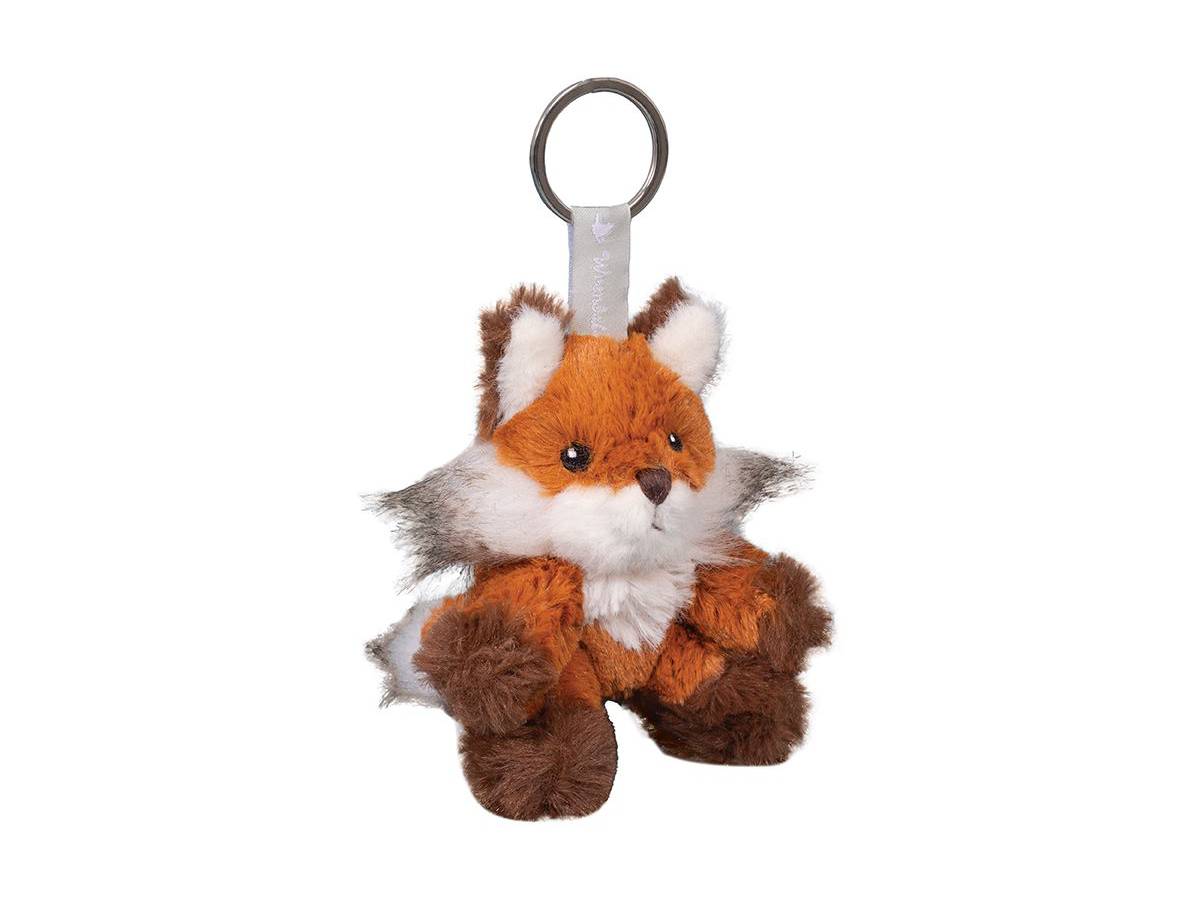 A plush fox keychain with orange, white, and brown fur details, featuring a small metal split ring at the top, shown against a plain white background.