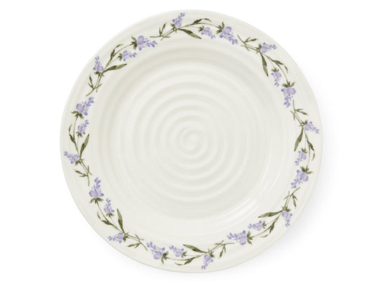 A white porcelain dinner plate that has been textured with Sophie Conran's staple ripple effect and printed with a chain of lavender around its outer edge. It is perfect for serving up a family feast and is microwave, oven, dishwasher and freezer safe.