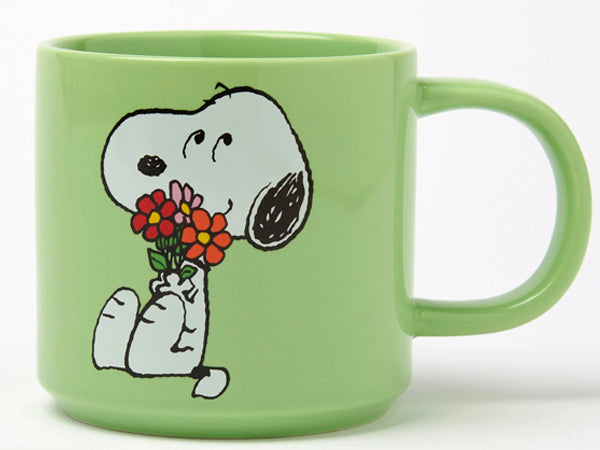 Magpie x Peanuts Snoopy Posy mug with Snoopy illustration and colourful floral bouquet design on a white ceramic mug