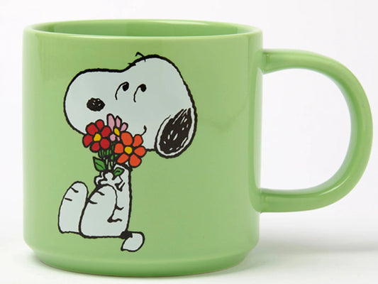 Magpie x Peanuts Snoopy Posy mug with Snoopy illustration and colourful floral bouquet design on a white ceramic mug