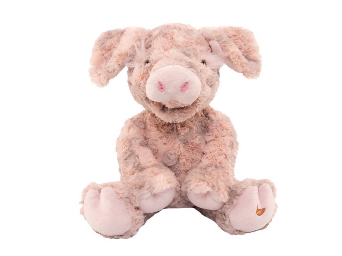 A plush stuffed pig toy in soft dusty pink and light beige tones, sitting against a plain white background.