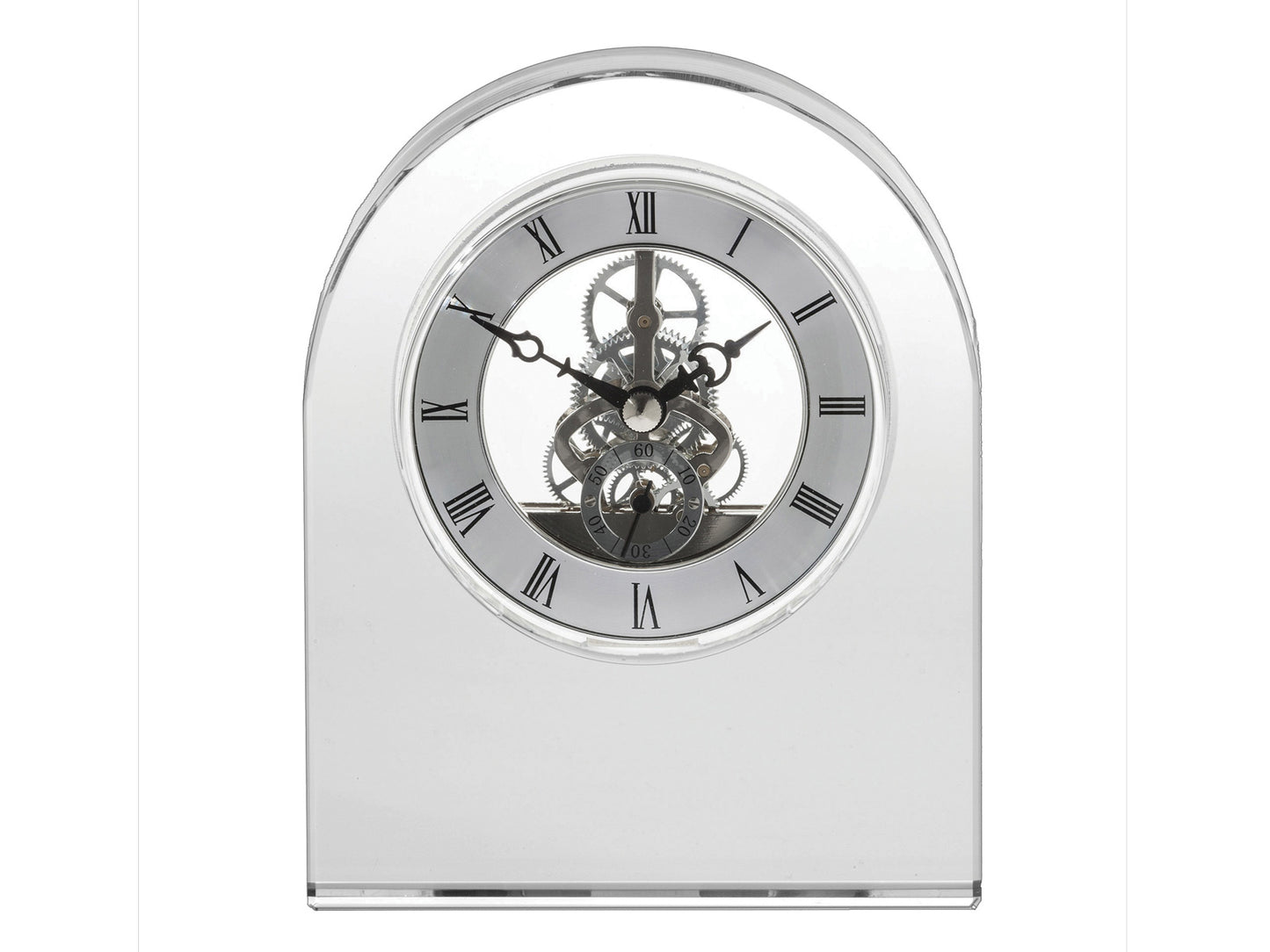A large crystal clock with a silver face with exposed mechanical workings.