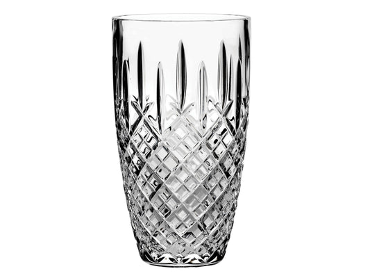 This Royal Scot Crystal London Vase - Barrel / Large has been hand-cut by expert artisans with the elegant London design. With a body that subtly widens upwards, this vase would be idea for displaying longer-stemmed floral arrangements.
