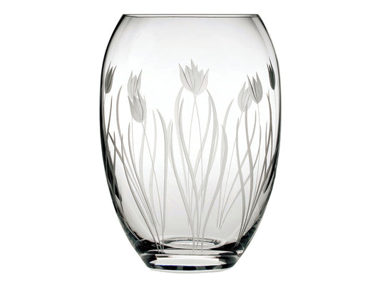 A medium-sized barrel-shaped crystal vase with a frosted tulip design cut into the outside of the vase