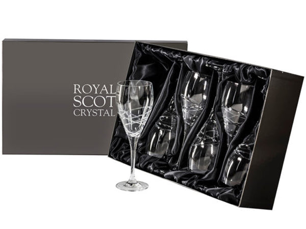 A set of six matching crystal wine glasses with an orbital design cut into the outside. They come in a gunmetal presentation box.