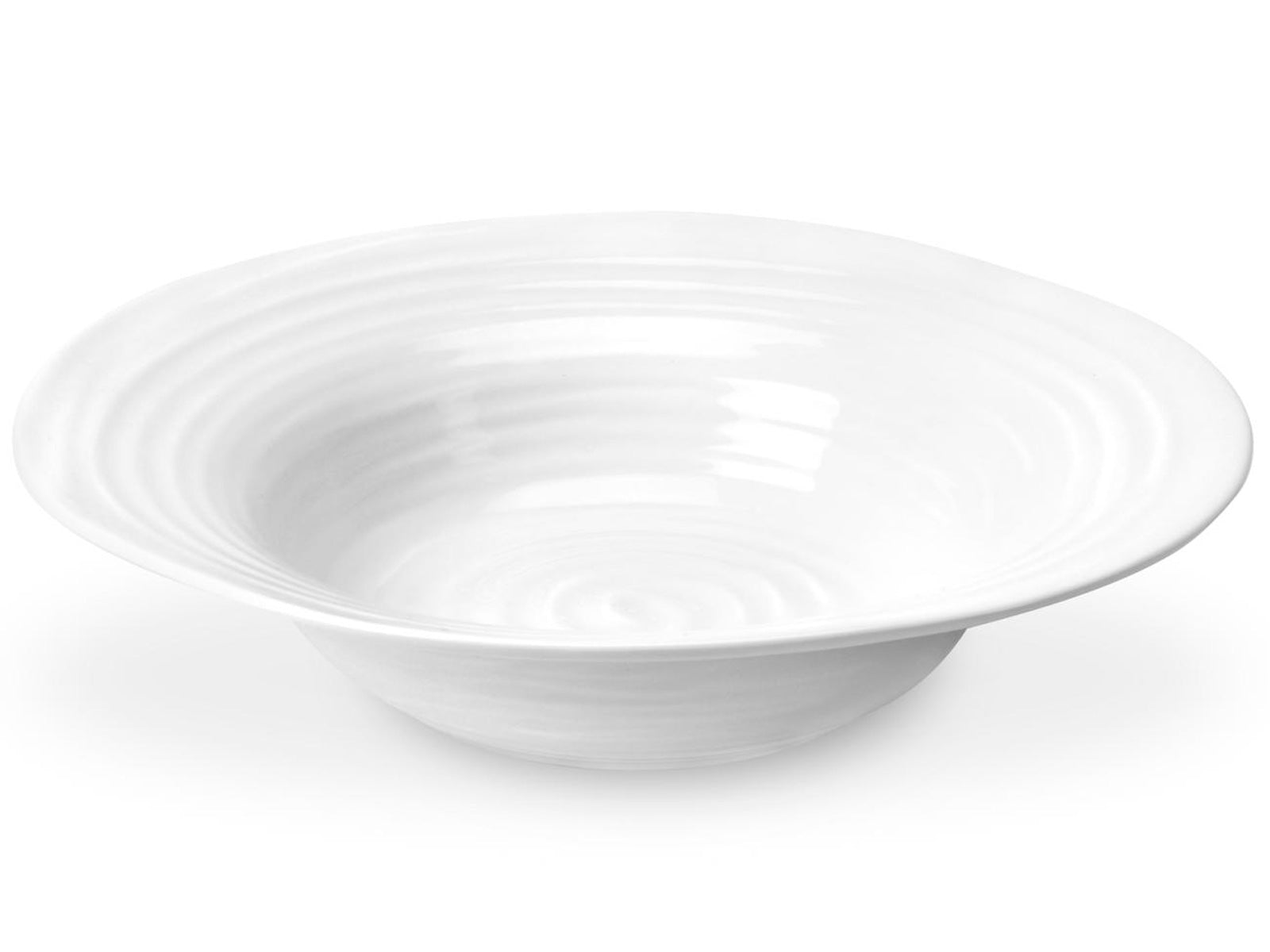 A wide-rimmed bowl made of textured white porcelain