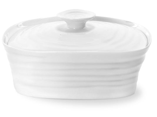 a textured white porcelain covered butter dish