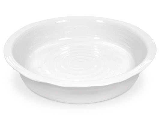 This Sophie Conran Pie Dish - White Round is designed with Sophie's staple rippled effect, and has been finished with a clear glaze to make the ceramic shine. Ideal for serving up savoury or sweet pies, this piece can go straight from the oven to the table and is safe to use in the freezer, microwave and dishwasher.