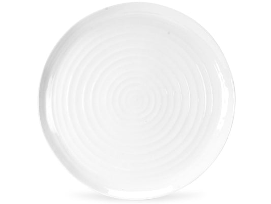 This Sophie Conran Round Platter (30.5cm) is ideal for serving up canapés at a dinner party. Designed with her staple rippling effect, this piece is stylish and contemporary, and is made of a white porcelain with a clear glaze finish.