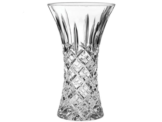 A large crystal vase with an hourglass shape that opens into a wide flare at the top. The cut pattern has a bed of diamonds around the base, topped with single flicks that reach up towards the smooth edge.